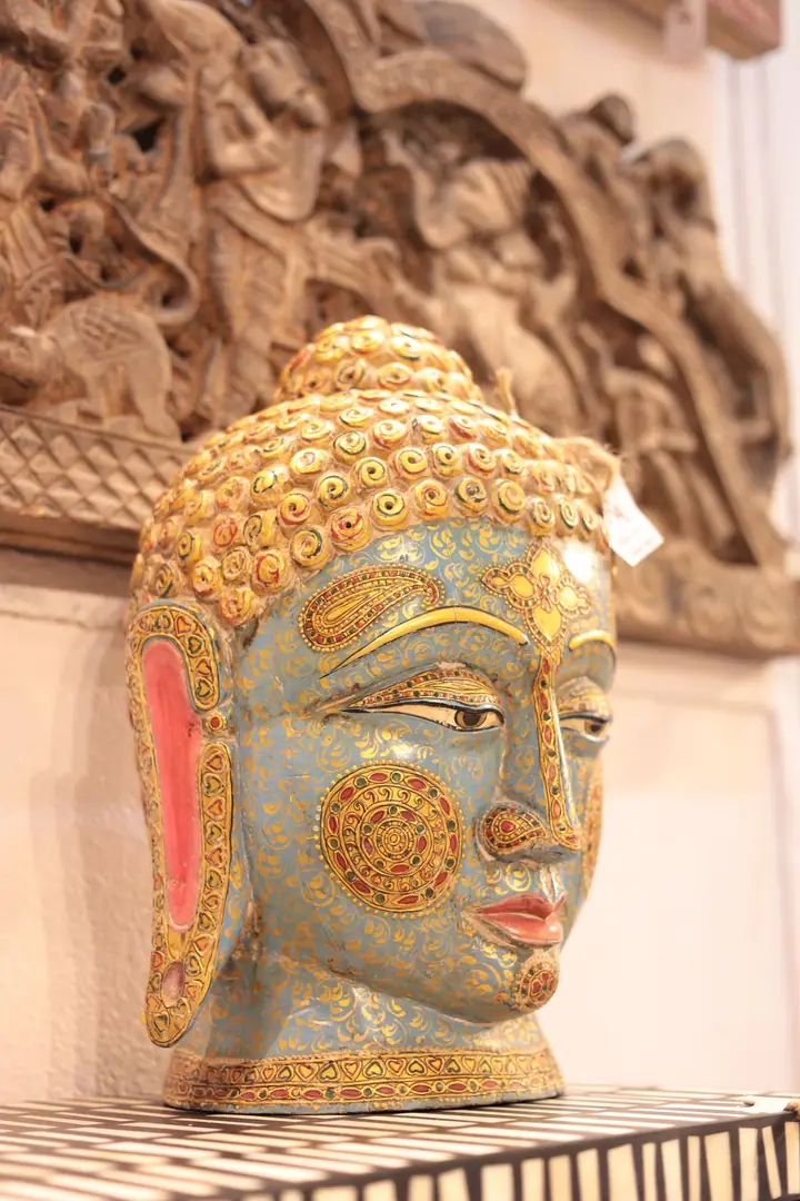 Carved Buddha head sculpture at FORHEX Fair 2024