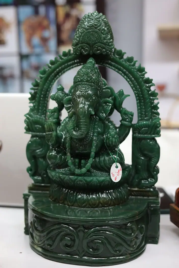 Green carved Ganesha idol at FORHEX Fair 2024