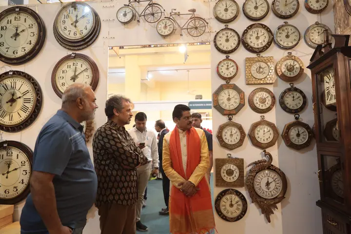 Guests at a wall-clock stall at FORHEX Fair 2024