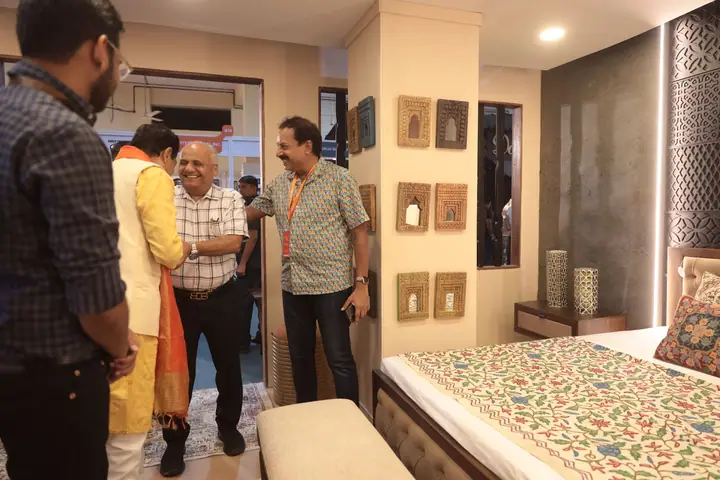 Guests touring a home decor booth at FORHEX Fair 2024